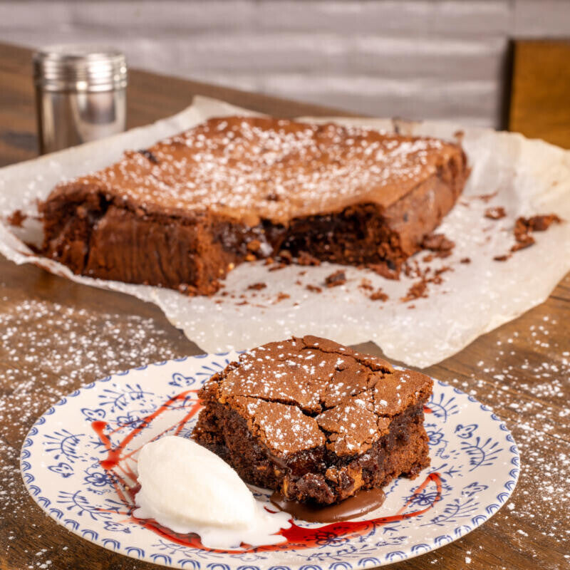 Chocolate Cake with Caramel, Pomegranate Cream, and Ice-Cream